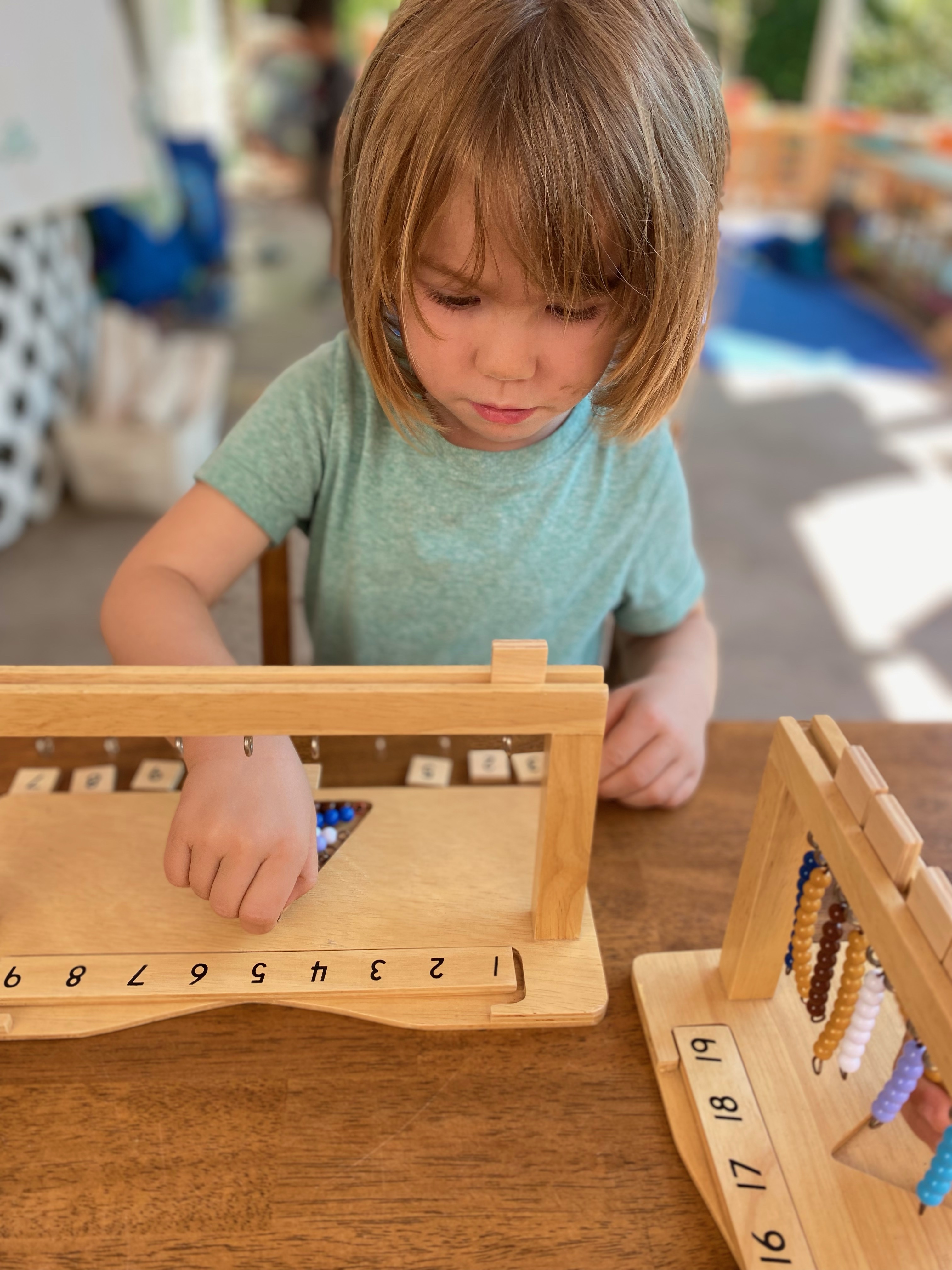 total focus while learning at this private preschool in San Diego